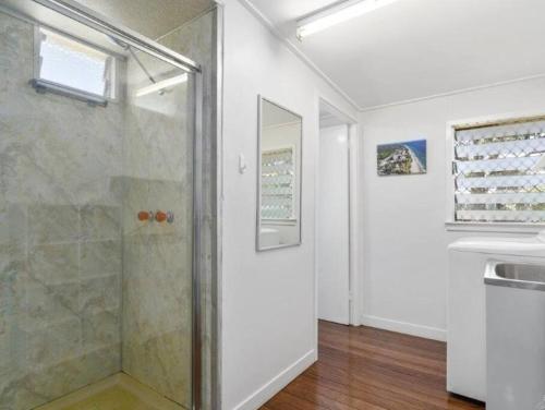 a bathroom with a shower and a sink at Relax on Rickman in Woorim