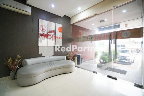 Posezení v ubytování Tirta Mansion Lippo Karawaci Mitra RedDoorz