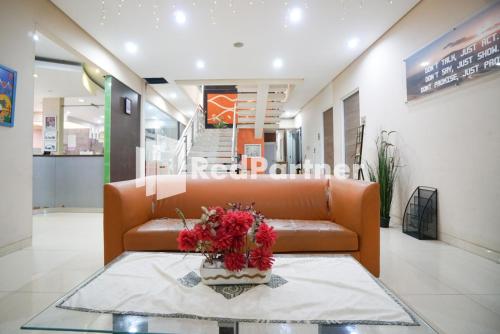 Posezení v ubytování Tirta Mansion Lippo Karawaci Mitra RedDoorz