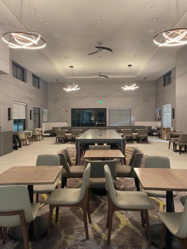 a large room with tables and chairs and a classroom at Homewood Suites By Hilton Oklahoma City Quail Springs in Oklahoma City
