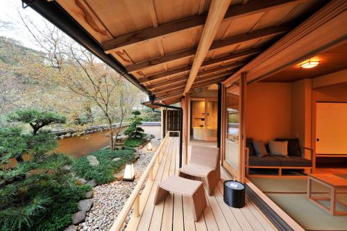 a house with a view of a river at Gora Kadan in Hakone