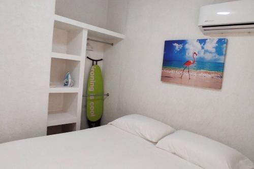 Postel nebo postele na pokoji v ubytování Casa Loma Flamingos Ixtapa