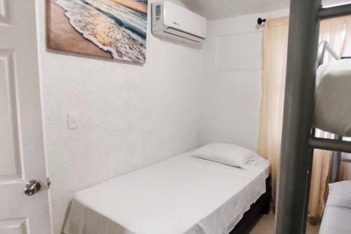 Postel nebo postele na pokoji v ubytování Casa Loma Flamingos Ixtapa