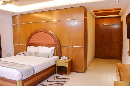 Ένα ή περισσότερα κρεβάτια σε δωμάτιο στο Hotel Afford Inn