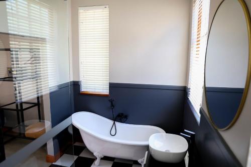 Ένα μπάνιο στο Uitsig Boutique Hotel