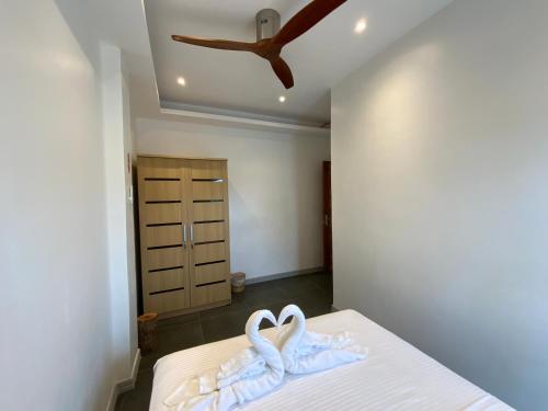 Cama o camas de una habitación en Puntakana Apartelle Cosy Apartment Panglao