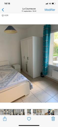 une chambre avec un lit et une fenêtre dans l'établissement Gite Mella, à La Courneuve