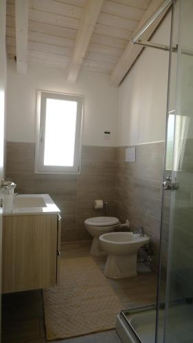 Et badeværelse på Villetta La Caletta