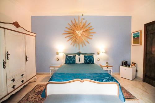 Katil atau katil-katil dalam bilik di Casa Nostra Boutique Hotel