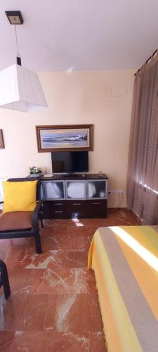 Telewizja i/lub zestaw kina domowego w obiekcie Apartamento Cordobán Centro