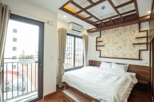 Postel nebo postele na pokoji v ubytování Sumitomo7 Apartment & Hotel