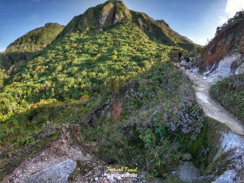 a trail on the side of a mountain at Nachelle Homestay in Berastagi