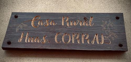 a wooden sign that reads casa rumpilli has corral at Casa rural Hnas Corral in Almoharín