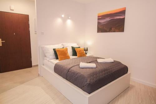 Postel nebo postele na pokoji v ubytování Apartament City Center Classic 2