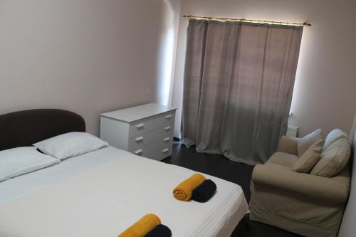 Postel nebo postele na pokoji v ubytování Gudauri Magistyle Penthouse