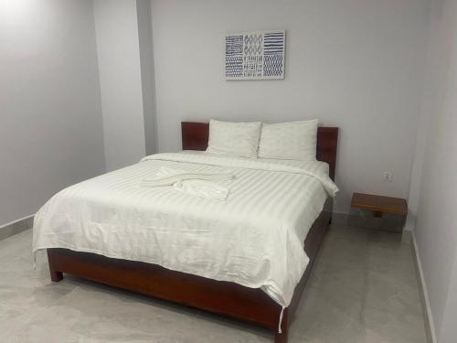 Ένα ή περισσότερα κρεβάτια σε δωμάτιο στο Residence 110 (Hotel and Apartments)