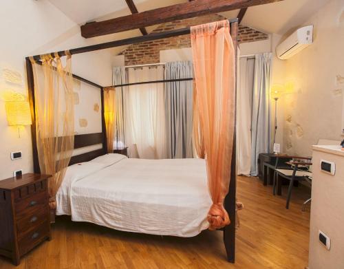 Cama o camas de una habitación en Maison Savoia B&b Apartment