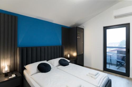 Postel nebo postele na pokoji v ubytování Boutique Suites Joyce Medulin with free parking