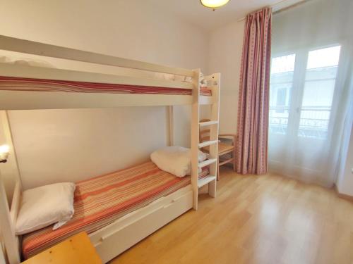 Posteľ alebo postele v izbe v ubytovaní Zénitude, T3, centre Luchon, wifi, casier à skis, ascenseur, 6 personnes