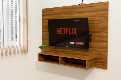 TV a/nebo společenská místnost v ubytování 204-FLAT-Espaço, conforto. É disso que você precisa!