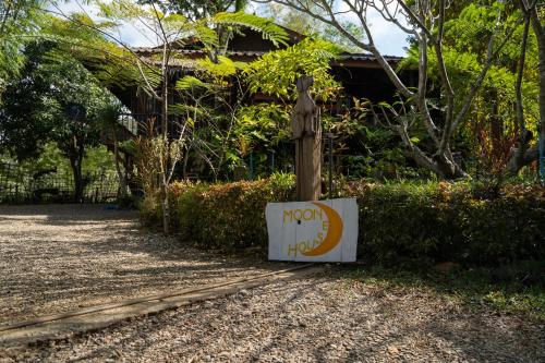 a sign that says morocco in front of a house at Art House at Chiangdao - Moon House in Chiang Dao