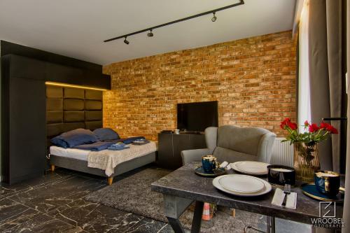 Ένα ή περισσότερα κρεβάτια σε δωμάτιο στο Jacuzzi Rakowicka Top Apartments