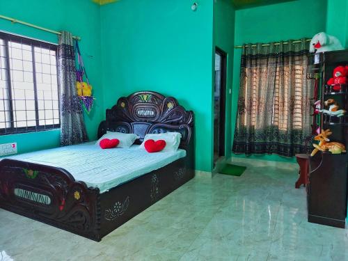 Postel nebo postele na pokoji v ubytování Tathāgata Homestay