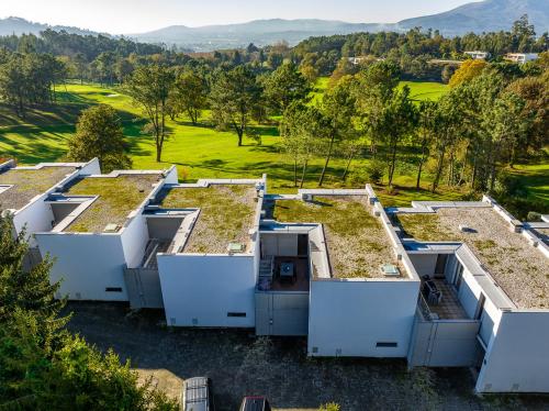 a row of green roofs with plants on them at Golf Course - Luxurious Flat T3 - Ponte de Lima in Ponte de Lima