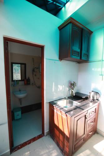 Кухня или мини-кухня в Du Homestay 1
