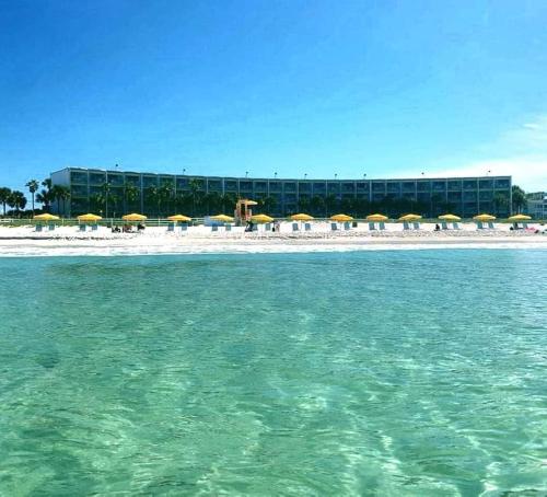 a view of a beach with umbrellas and the ocean at Casa Loma Panama City Beach - Beachfront in Panama City Beach