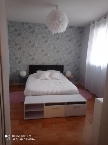 Posteľ alebo postele v izbe v ubytovaní Le Cosy