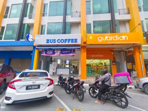 a group of motorcycles parked in front of a building at Pavilionvillie M1T584 by irainbow in Simpang Pulai