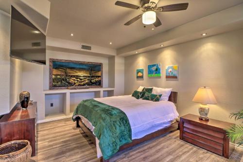 a bedroom with a bed and a ceiling fan at Lavish Family Escape with Game Room in Avondale! in Avondale