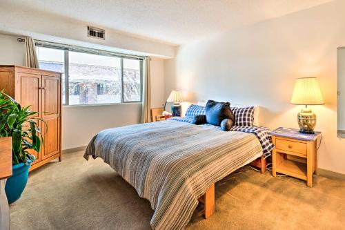 a bedroom with a bed and a window at Charming Boulder Condo Less Than 4 Mi to Downtown! in Boulder