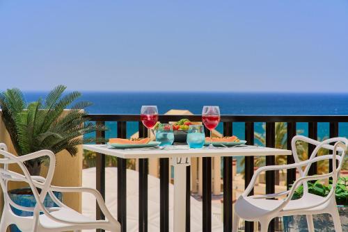 Honeymoon Corner Suite, sun-all-day terrace on the best beach of Marbella
