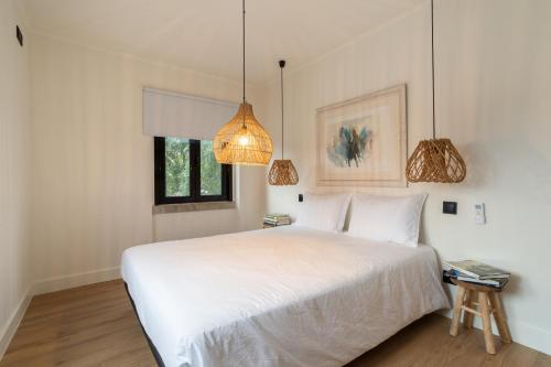Postel nebo postele na pokoji v ubytování Vila Fresca Apartment
