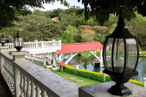 a bridge over a body of water with a bridge over a river at La Gran Estancia Hotel Campestre in Chachagüí