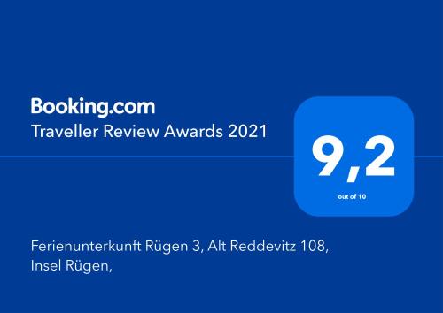 una captura de pantalla de los premios de revisión de viajes con una caja azul en Ferienunterkunft Rügen 3, Alt Reddevitz 108, Insel Rügen, Sauna Nutzung möglich, en Alt Reddevitz