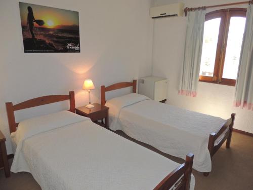 Postel nebo postele na pokoji v ubytování Hotel La Casona