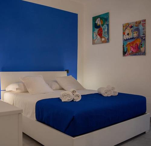 Ένα ή περισσότερα κρεβάτια σε δωμάτιο στο casa vacanze Frontemare
