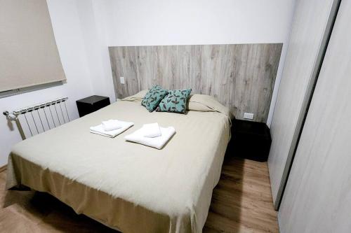 Una cama o camas en una habitación de Aires Verdes