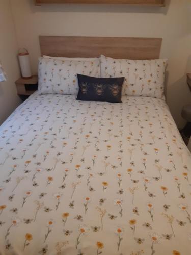 Postel nebo postele na pokoji v ubytování Bimble Lodge