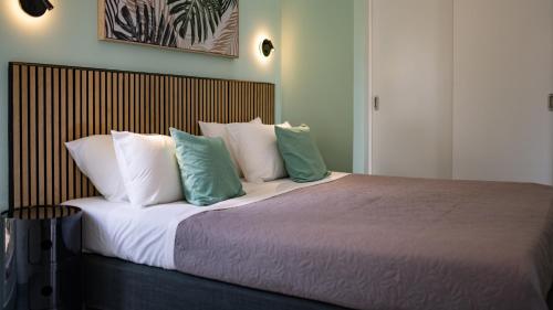 Postel nebo postele na pokoji v ubytování Blue Bay Lodges