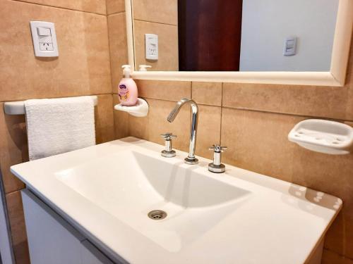 Ванна кімната в Servando Deptos turísticos