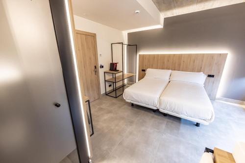 Hospedium Hotel Devalar Do Marにあるベッド