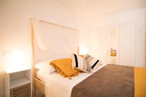Кровать или кровати в номере Casa Napoletana - Dante