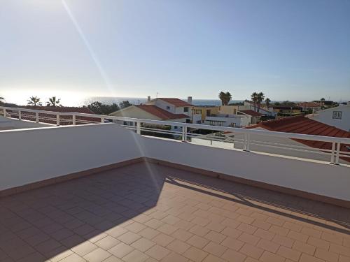 a balcony with a view of a city at Vista Mar in Viana do Castelo