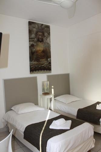 Postel nebo postele na pokoji v ubytování Hotel Danemark