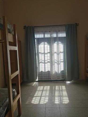 Nido Colibrí - Private Rooms and hostel Dorms in Remate de Paseo Montejoにあるベッド