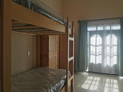 Nido Colibrí - Private Rooms and hostel Dorms in Remate de Paseo Montejoにあるベッド